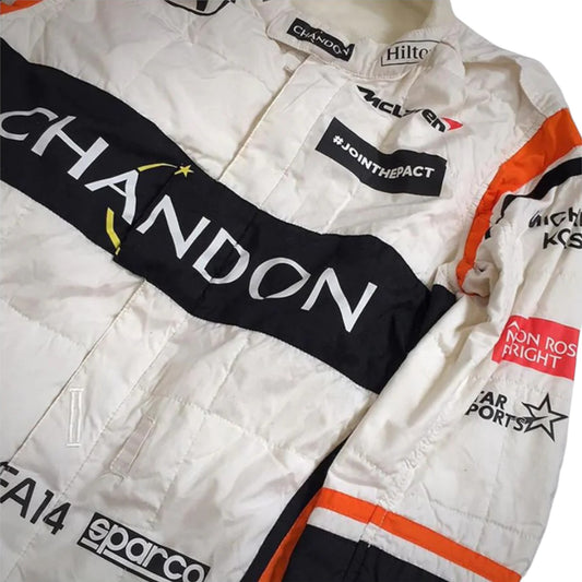 Fernando Alonso 2017 McLaren Honda F1 race suit replica with white, navy, and orange design featuring Chandon sponsor