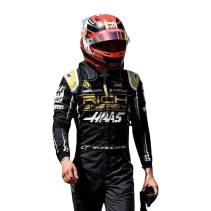 Kevin Magnussen 2019 Haas F1 race suit replica with black and gold design featuring Rich Energy branding